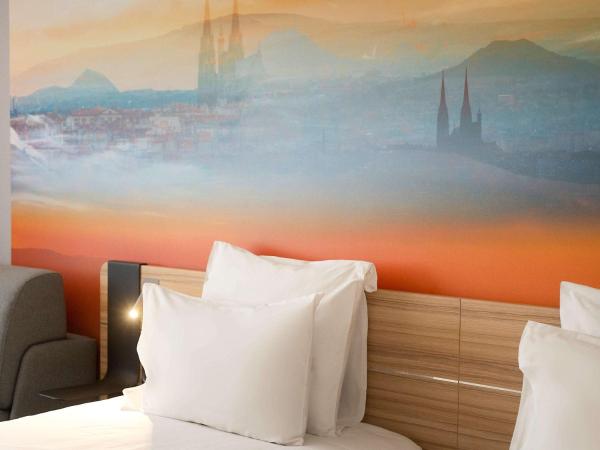 Novotel Clermont-Ferrand : photo 3 de la chambre chambre lit queen-size supérieure avec canapé-lit