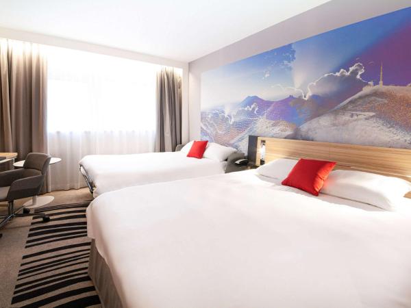 Novotel Clermont-Ferrand : photo 8 de la chambre chambre lit queen-size supérieure avec canapé-lit