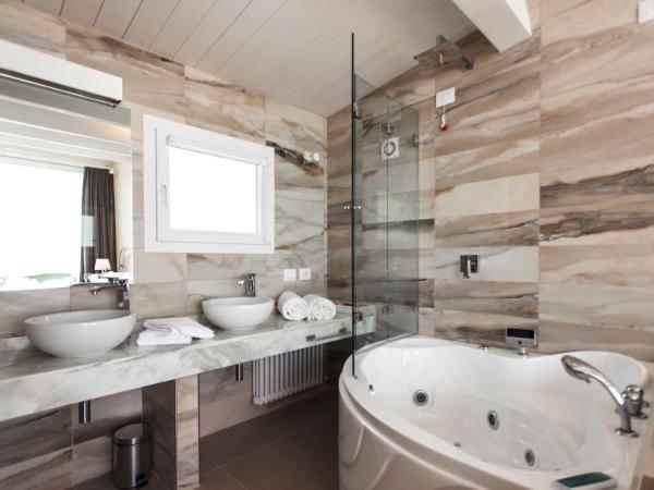 Princier Fine Resort & SPA : photo 6 de la chambre suite lit queen-size avec jacuzzi - vue sur mer