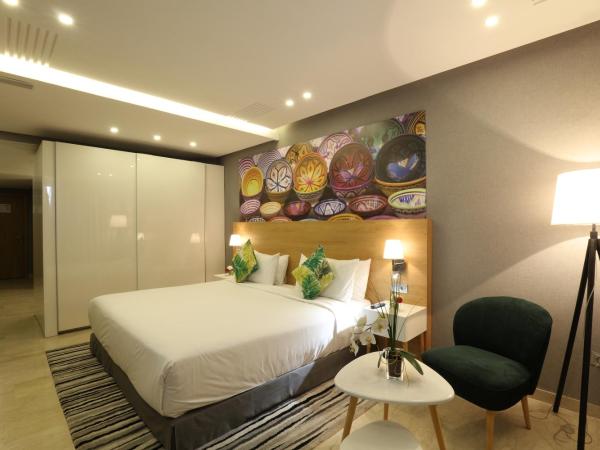 Mid Town Hotel Casablanca : photo 8 de la chambre chambre double deluxe (2 adultes + 1 enfant)