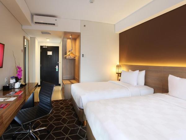 Swiss-Belinn Tunjungan Surabaya : photo 2 de la chambre chambre lits jumeaux deluxe