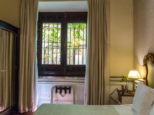 Hotel Casa 1800 Granada : photo 4 de la chambre chambre supérieure avec lit d'appoint