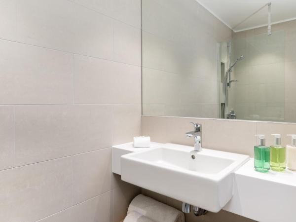 The Lincoln Suites : photo 4 de la chambre chambre lit king-size