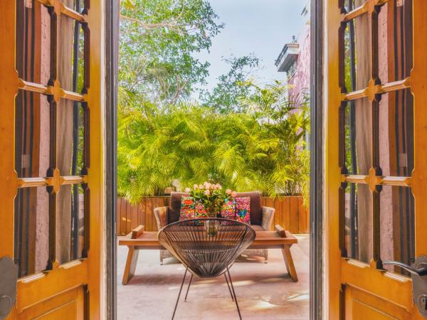 Rosas & Xocolate Boutique Hotel and Spa Merida, a Member of Design Hotels : photo 2 de la chambre suite master