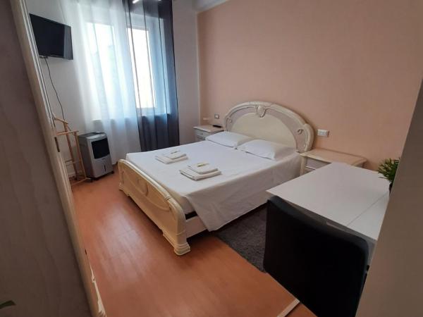 ALESSANDRA'S HOME : photo 1 de la chambre chambre double standard avec salle de bains privative