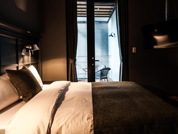 SR Hotel Sadang : photo 2 de la chambre chambre double de luxe 