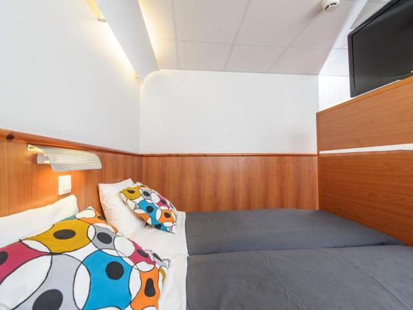 Forenom Aparthotel Tampere : photo 5 de la chambre chambre triple avec 3 lits simples