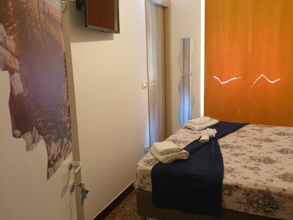 House LeoMar di Sara : photo 10 de la chambre chambre triple classique