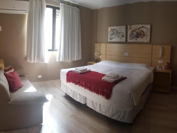 SJ Executive - San Juan Curitiba : photo 2 de la chambre suite familiale