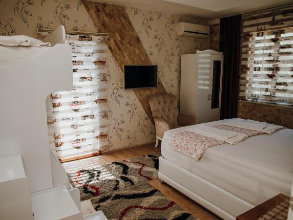 Sinter Terasse House Hotel : photo 6 de la chambre chambre familiale avec balcon