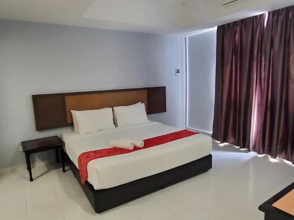Leisure Cove Hotel and Apartments : photo 10 de la chambre suite studio - 1 lit king-size