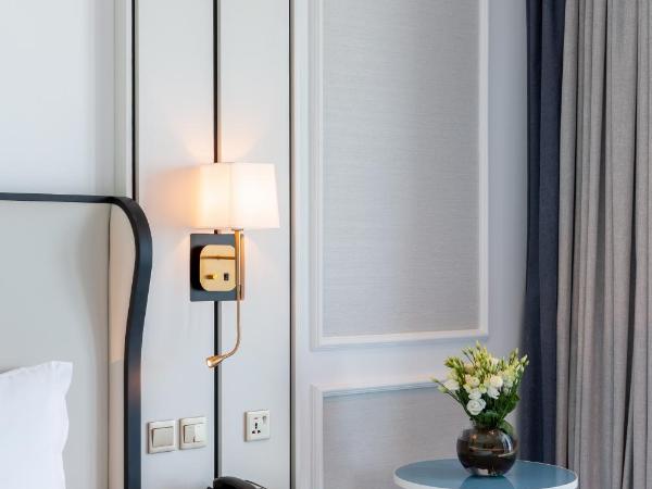 Sofitel Dubai Jumeirah Beach : photo 7 de la chambre chambre lit king-size de luxe - vue sur mer - accès à la piscine 