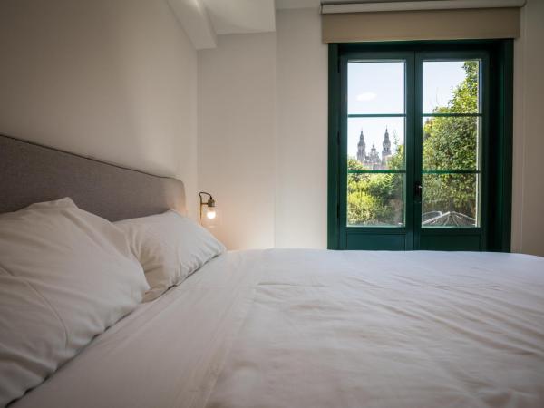 Hotel Pombal Rooms : photo 8 de la chambre chambre double ou lits jumeaux supérieure avec vue sur ville