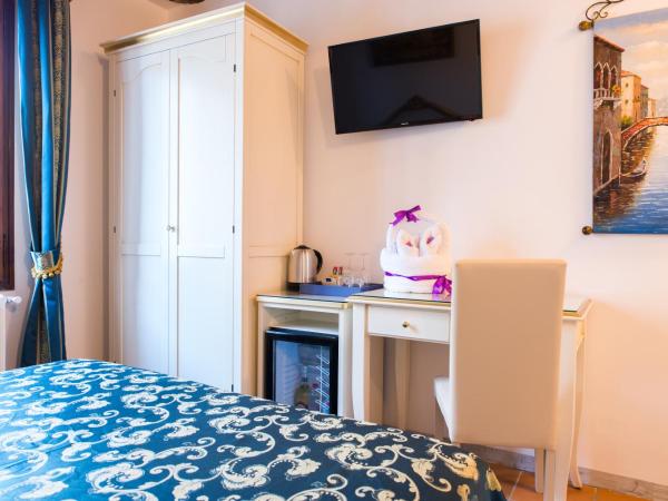 Al Mascaron Ridente : photo 6 de la chambre chambre double ou lits jumeaux - vue sur canal