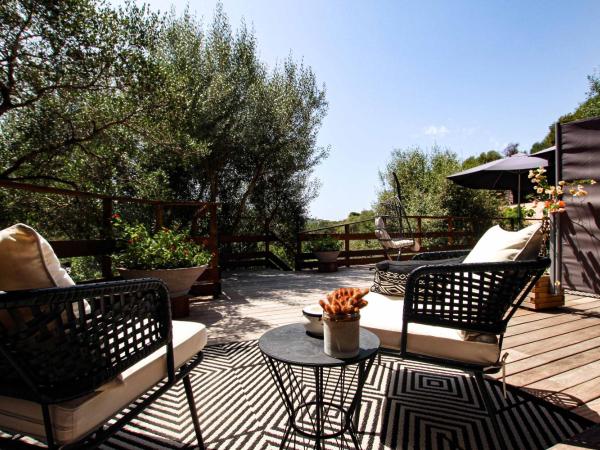 Chambre d'hôtes A Vadina Porticcio : photo 2 de la chambre chambre double avec salle de bains privative