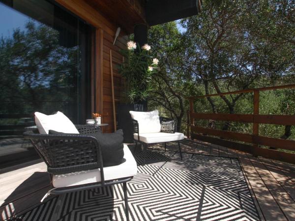 Chambre d'hôtes A Vadina Porticcio : photo 3 de la chambre chambre double avec salle de bains privative