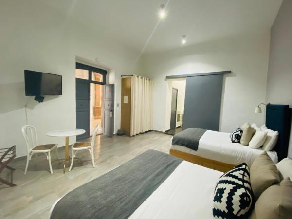 Markee Hotel Boutique : photo 3 de la chambre suite junior avec 2 lits doubles