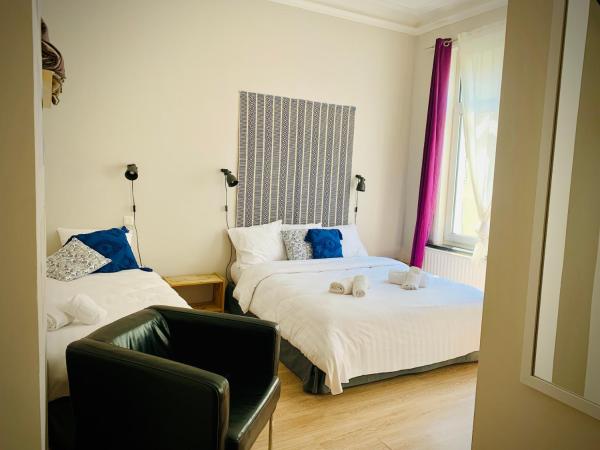 Hotel Du Parlement : photo 1 de la chambre chambre triple