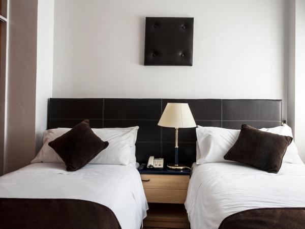 Hotel Cristoforo Colombo : photo 2 de la chambre chambre lits jumeaux