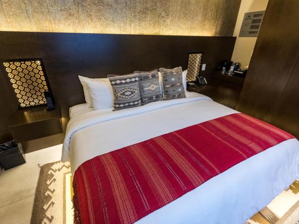 Casa Naila Hotel Boutique : photo 6 de la chambre chambre lit king-size - vue sur jardin