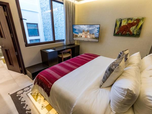 Casa Naila Hotel Boutique : photo 7 de la chambre chambre lit king-size - vue sur jardin