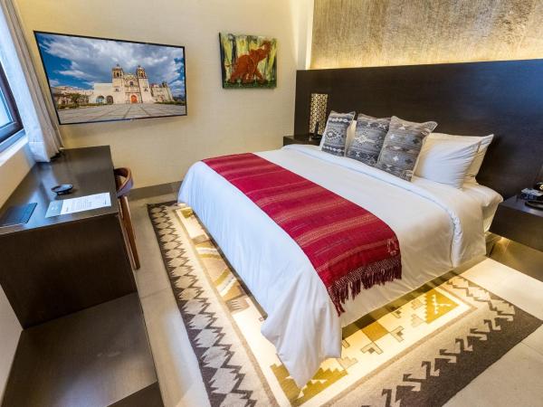 Casa Naila Hotel Boutique : photo 8 de la chambre chambre lit king-size - vue sur jardin