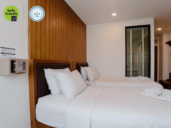 the echo hotel : photo 1 de la chambre hébergement lits jumeaux standard - vue sur ville