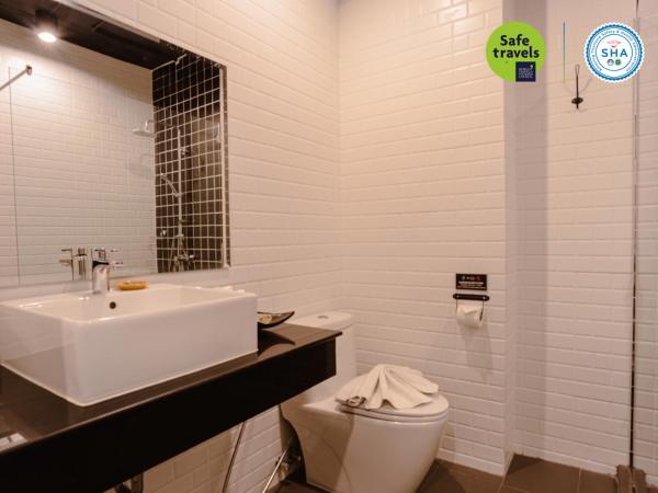 the echo hotel : photo 3 de la chambre hébergement lits jumeaux standard - vue sur ville