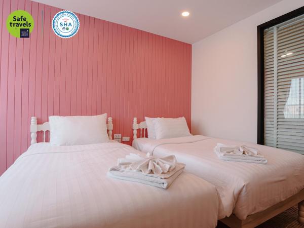 the echo hotel : photo 8 de la chambre hébergement lits jumeaux standard - vue sur ville