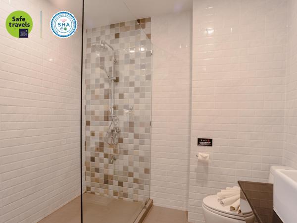 the echo hotel : photo 10 de la chambre hébergement de luxe - vue sur jardin