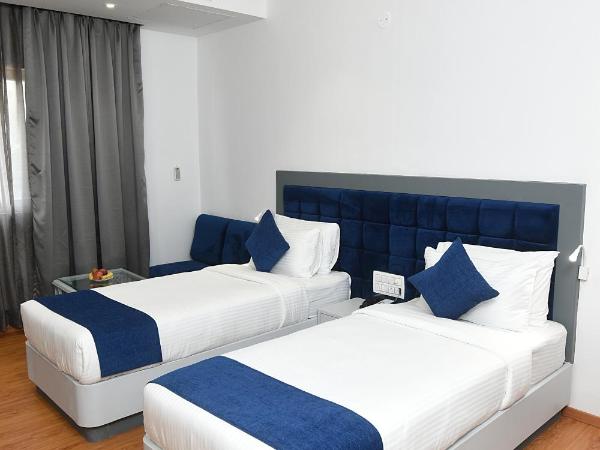 Kyriad Hotel Pimpri : photo 1 de la chambre chambre lits jumeaux supérieure