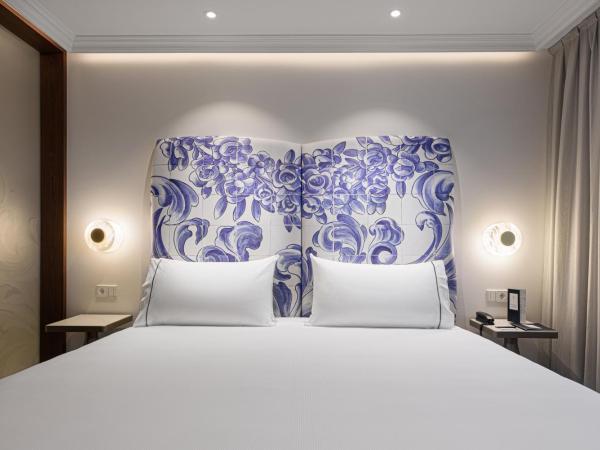 Eurostars Universal Lisboa : photo 7 de la chambre chambre deluxe double ou lits jumeaux