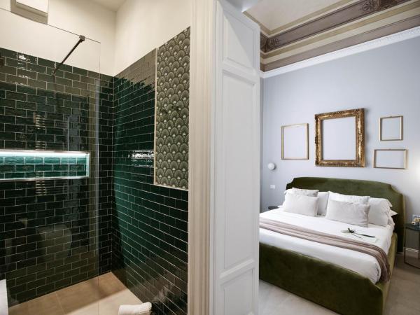 Family Affair Luxury Rooms&Suites : photo 5 de la chambre chambre deluxe