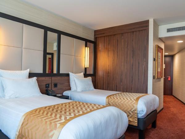 Nash Suites Airport Hotel : photo 9 de la chambre suite supérieure lits jumeaux