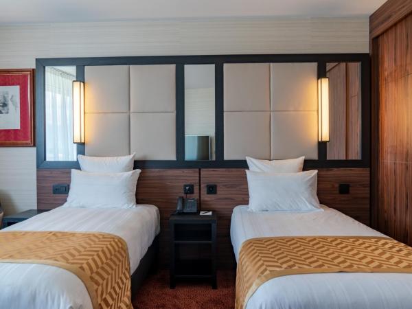 Nash Suites Airport Hotel : photo 10 de la chambre suite supérieure lits jumeaux
