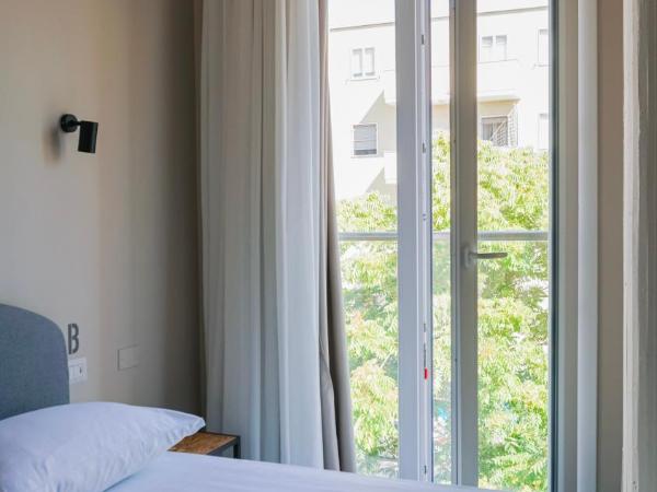 Piccolo Catalunya Hostel : photo 6 de la chambre chambre double ou lits jumeaux avec salle de bains privative