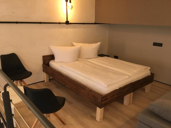 Cityflair Berlin Apartments & Rooms : photo 7 de la chambre chambre familiale