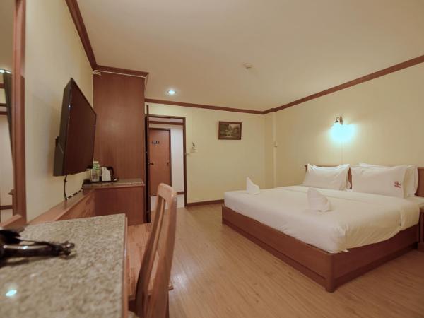 Hua Lin Inn : photo 1 de la chambre chambre lit queen-size deluxe