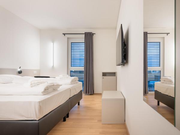 Hotel AT HOME - late arrival self check in : photo 3 de la chambre chambre double ou lits jumeaux