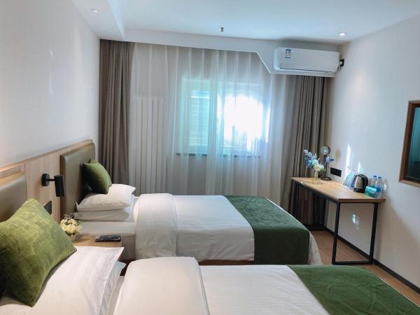 GreenTree Inn Tianjin Xiqing District Xiuchuan Road Sunshine 100 : photo 2 de la chambre offre spéciale réservée aux citoyens de chine continentale – chambre lit queen-size