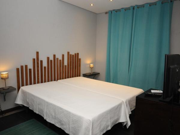 Lost & Found - Guesthouse & Suites : photo 4 de la chambre chambre lits jumeaux