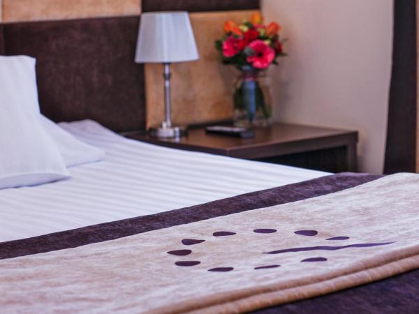Boutique Hotel's I : photo 1 de la chambre chambre simple standard