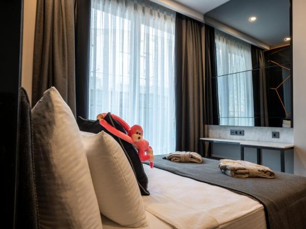 Lucky Monkey Hotel : photo 10 de la chambre chambre double deluxe - vue latérale sur mer