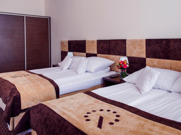 Boutique Hotel's I : photo 1 de la chambre chambre familiale