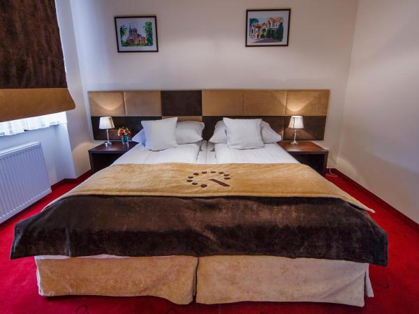 Boutique Hotel's II : photo 5 de la chambre chambre lits jumeaux