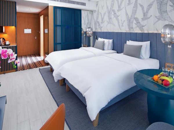 C Central Hotel and Resort The Palm : photo 2 de la chambre chambre familiale communicante