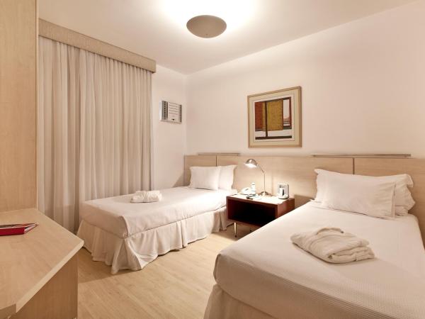 Promenade Pancetti Belo Horizonte : photo 1 de la chambre suite lits jumeaux exécutive