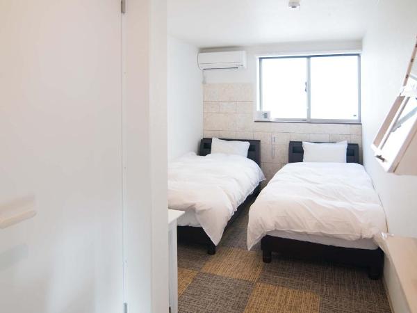 Kyo-Anthu Inn : photo 5 de la chambre chambre lits jumeaux avec douche