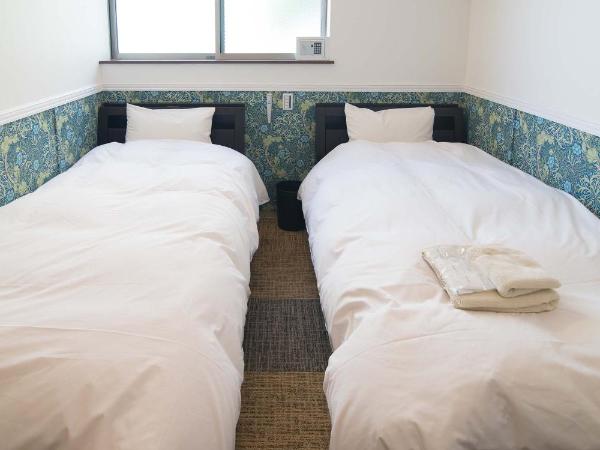 Kyo-Anthu Inn : photo 4 de la chambre chambre lits jumeaux avec douche