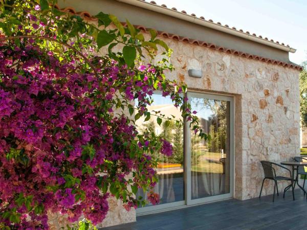 LAGUNA HOLIDAY RESORT : photo 5 de la chambre chambre familiale - vue sur jardin